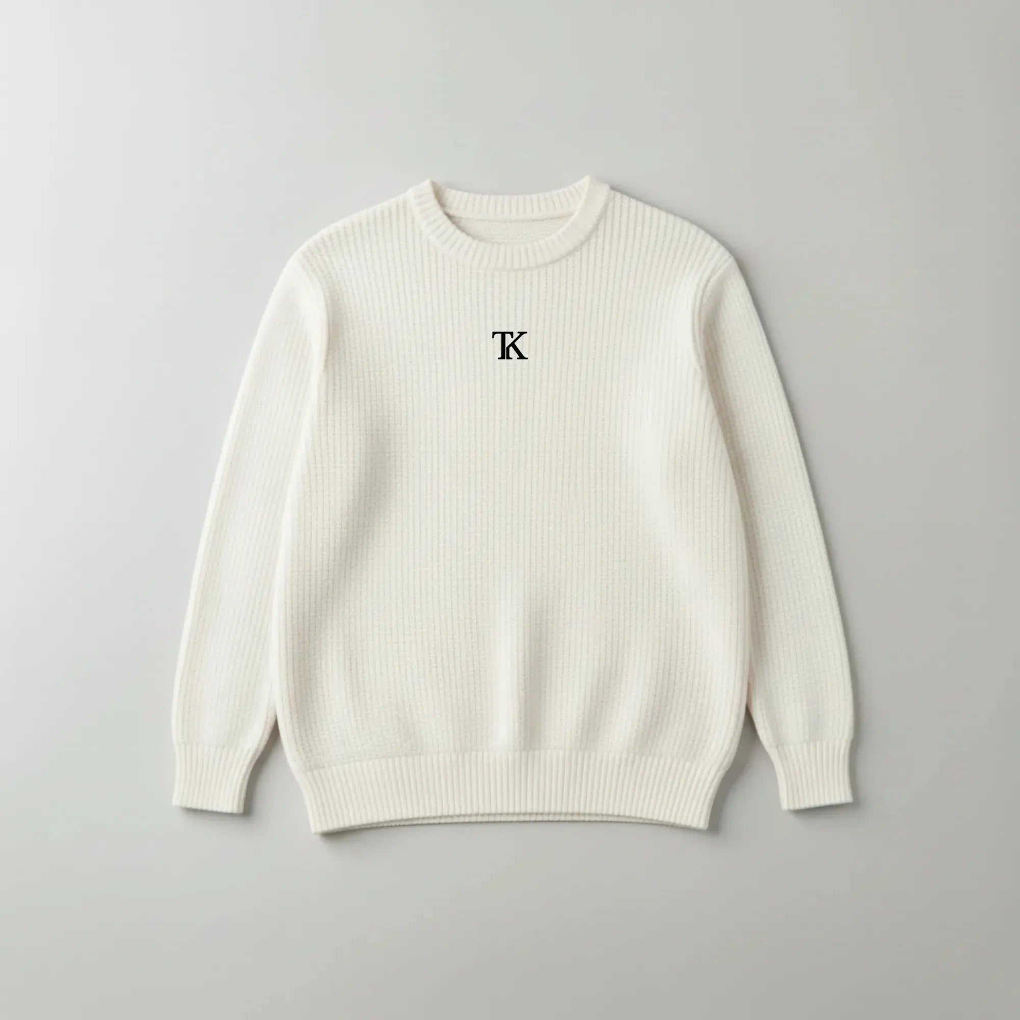 سترةً بياقةٍ دائريةٍ مزخرفةً بنسيجٍ محبوكٍ مُربّع